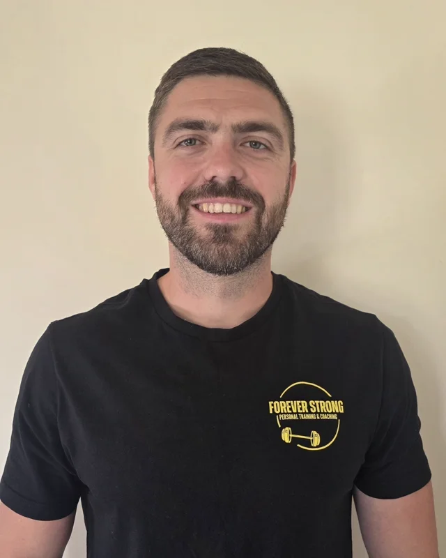 Dan Turner, personal trainer, in a Forever Strong Coaching t-shirt